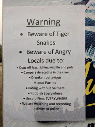 beware of tiger snakes sign at the Tassie Trail Fest